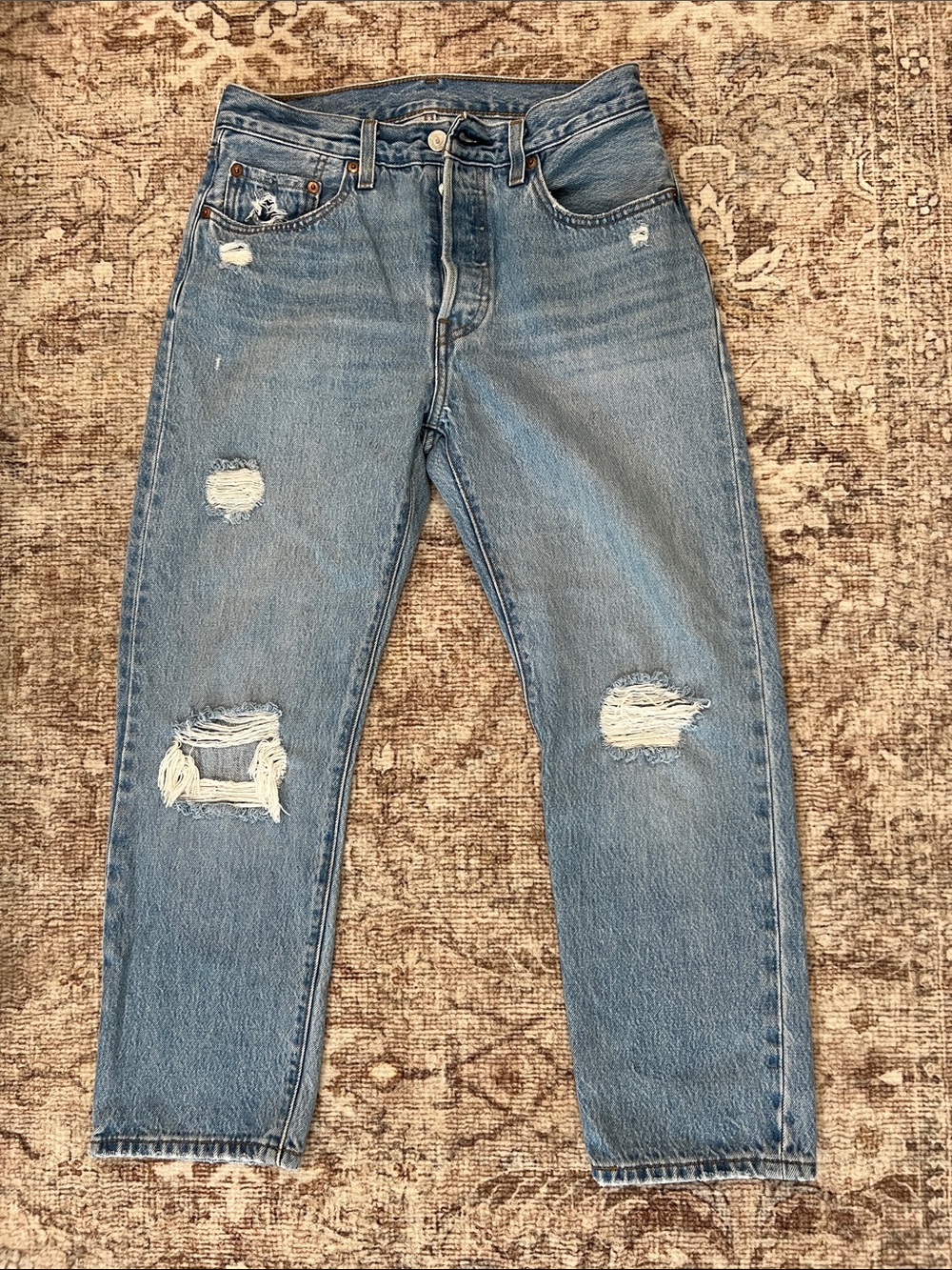 Levi’s 501 Light Blue Distressed Jeans